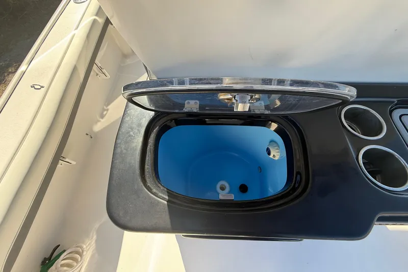 Slide: The Image of Livewell on 2021 Tidewater 2700 Carolina Bay boat with cup holders. - 34