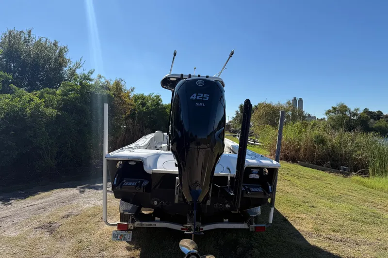 Slide: The Image of 2021 Tidewater 2700 Carolina Bay boat with Yamaha 425 engine on trailer. - 4