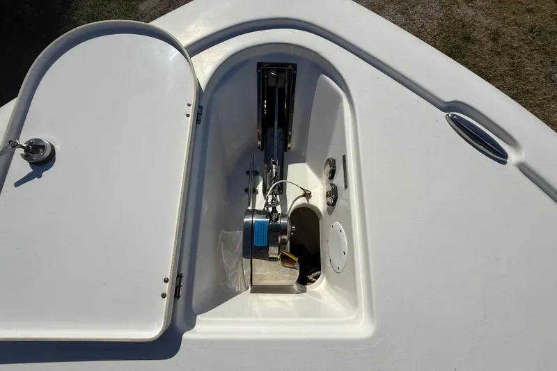 Slide: The Image of 2021 Tidewater 2700 Carolina Bay boat anchor compartment with open hatch. - 50