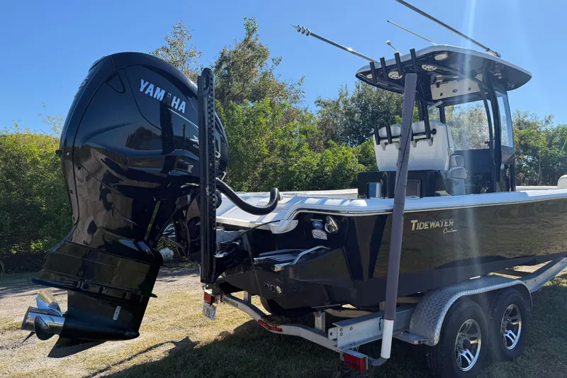 Slide: The Image of 2021 Tidewater 2700 Carolina Bay boat with Yamaha engine on trailer. - 6