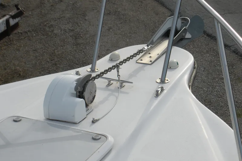 Slide: The Image of 2005 Baha Cruisers 299 SF boat anchor system with chain and winch. - 2