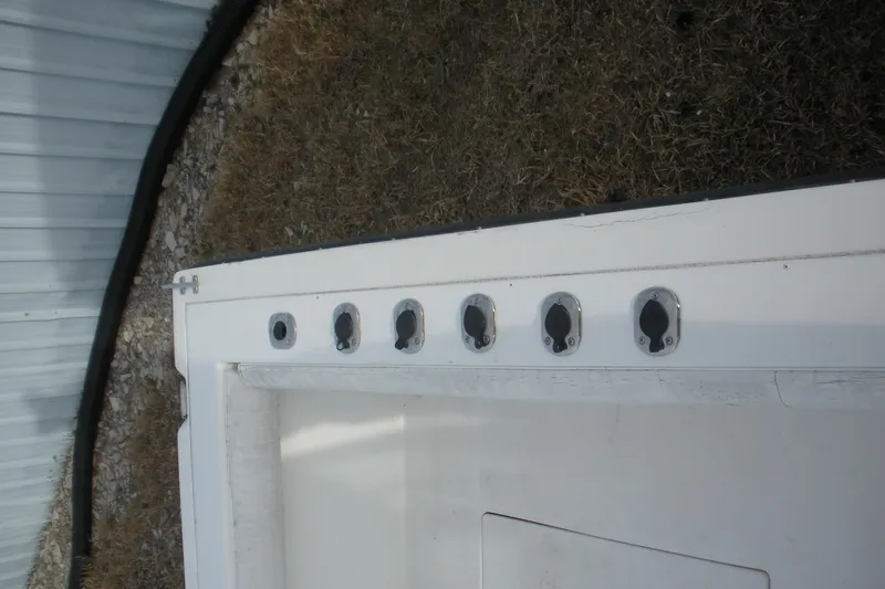 Slide: The Image of 2005 Baha Cruisers 299 SF boat deck with multiple rod holders. - 20