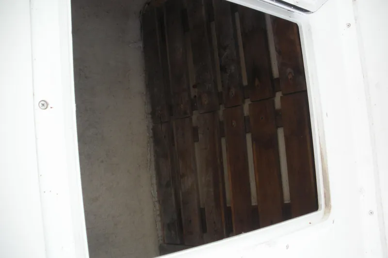 Slide: The Image of 2005 Baha Cruisers 299 SF boat interior with wooden flooring detail. - 22