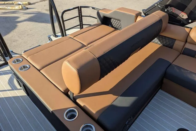 Slide: The Image of Luxurious seating on 2026 Berkshire 25SB2 STS 3.0 pontoon boat with cup holders. - 11
