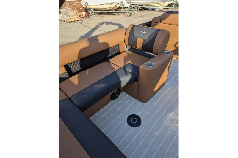 Slide: The Image of Luxurious seating on 2026 Berkshire 25SB2 STS 3.0 boat with cup holders. - 15