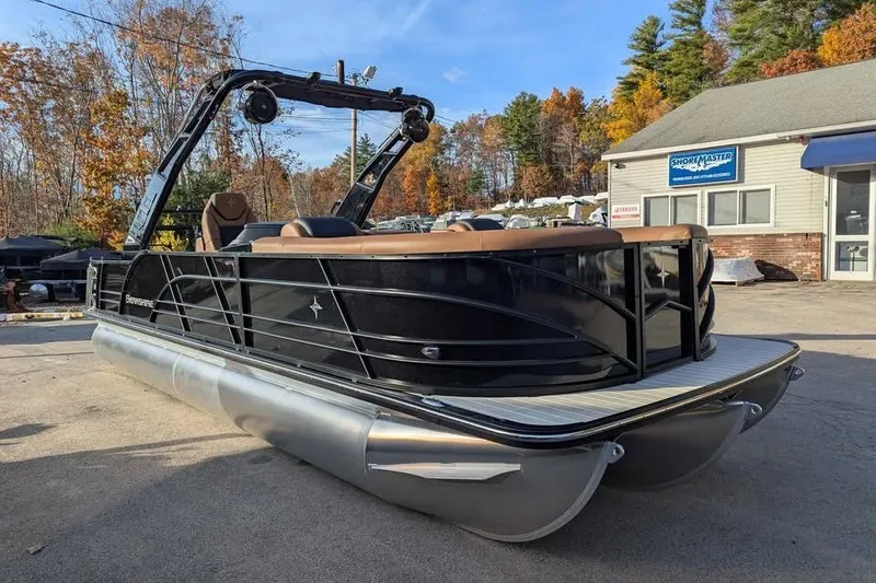 Slide: The Image of 2026 Berkshire 25SB2 STS 3.0 pontoon boat in a dealership lot, autumn background. - 5