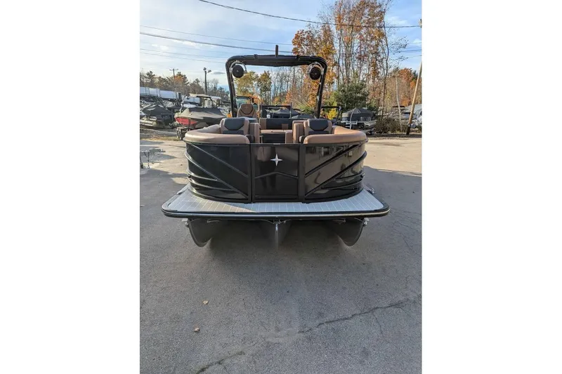 Slide: The Image of 2026 Berkshire 25SB2 STS 3.0 pontoon boat, black exterior, parked outdoors. - 6