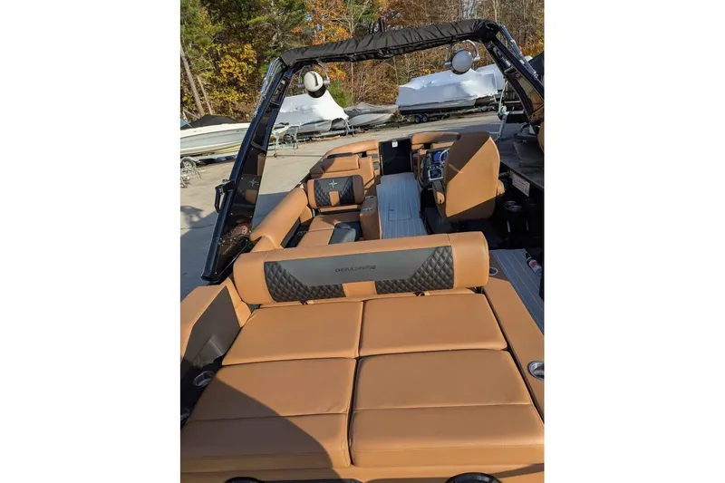 Slide: The Image of 2026 Berkshire 25SB2 STS 3.0 boat interior with tan seating and modern design. - 7