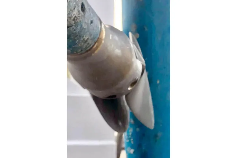 Slide: The Image of Propeller of 1981 Beneteau First 32 sailboat, close-up view. - 14