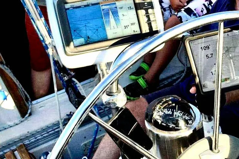 Slide: The Image of Cockpit of 1981 Beneteau First 32 sailboat with navigation instruments and compass. - 6