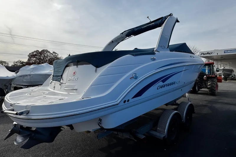 Slide: The Image of 2008 Chaparral 256 SSi boat on trailer, parked outdoors, side view. - 1