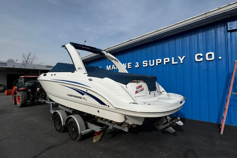 Slide: The Image of 2008 Chaparral 256 SSi boat on trailer outside Marine Supply Co. building. - 3