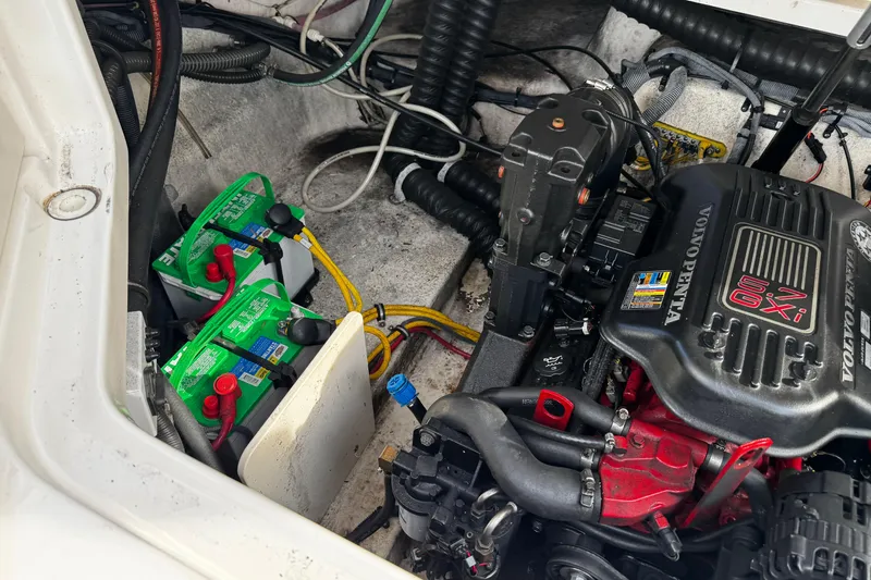 Slide: The Image of Engine compartment of 2008 Chaparral 256 SSi with Volvo Penta engine and batteries. - 40