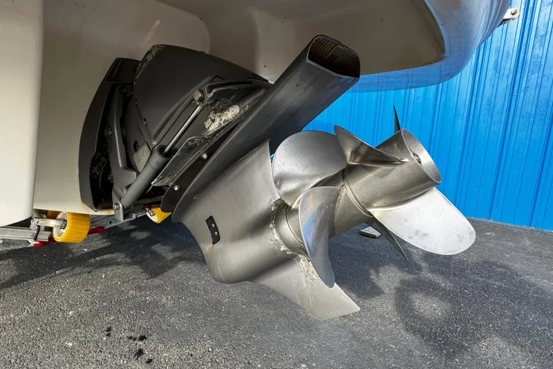 Slide: The Image of Close-up of 2008 Chaparral 256 SSi boat propeller against blue wall. - 43