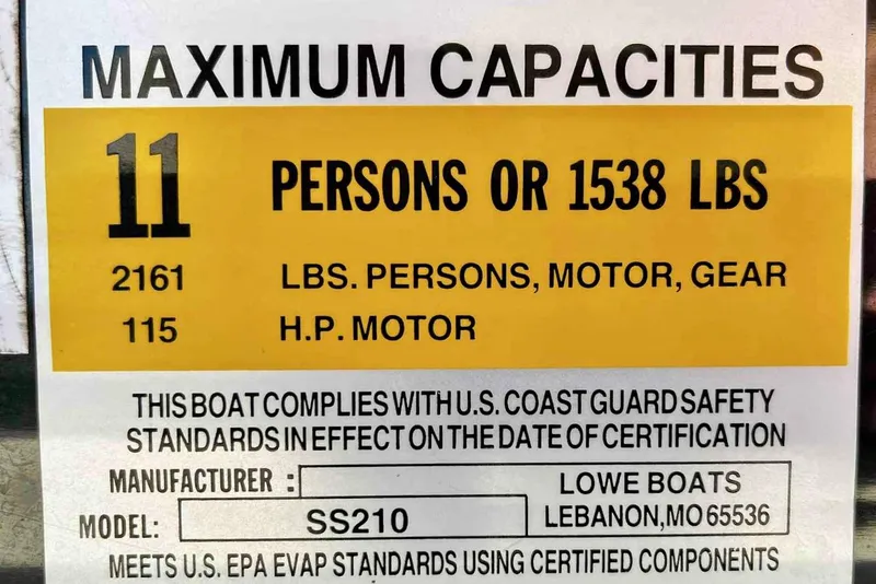 Slide: The Image of 2015 Lowe SS 210 pontoon boat with Mercury 115 engine, parked outdoors. - 12