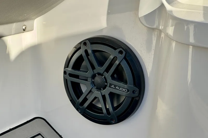 Slide: The Image of JL Audio speaker installed on 2005 Yamaha SX230 boat interior. - 14