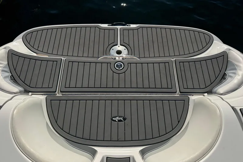 Slide: The Image of 2005 Yamaha Boats SX230 swim platform with gray non-slip decking. - 16