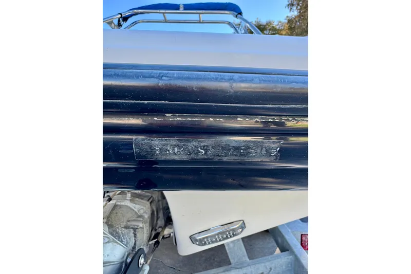 Slide: The Image of 2005 Yamaha Boats SX230 hull detail with visible identification number. - 21