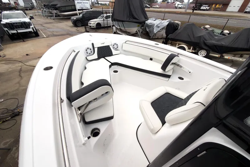 Slide: The Image of 2026 Tidewater 210 LXF boat interior with white seating and modern design. - 35
