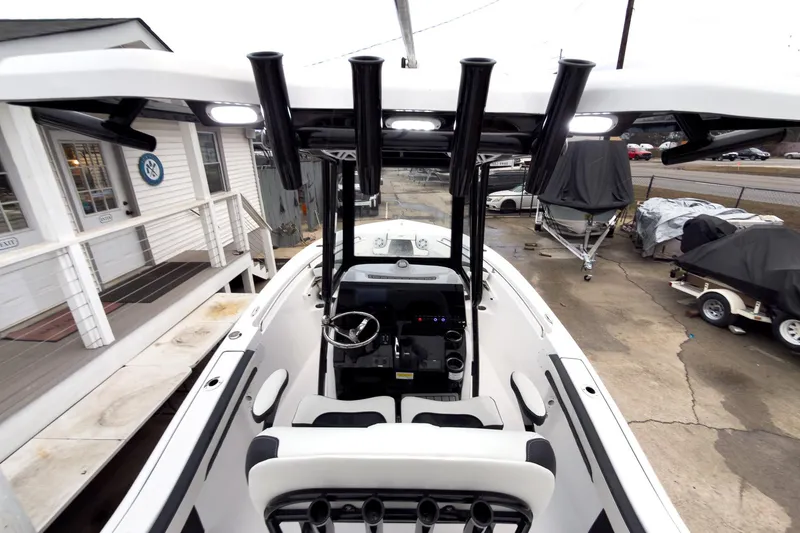 Slide: The Image of 2026 Tidewater 210 LXF boat interior with modern helm and seating. - 7