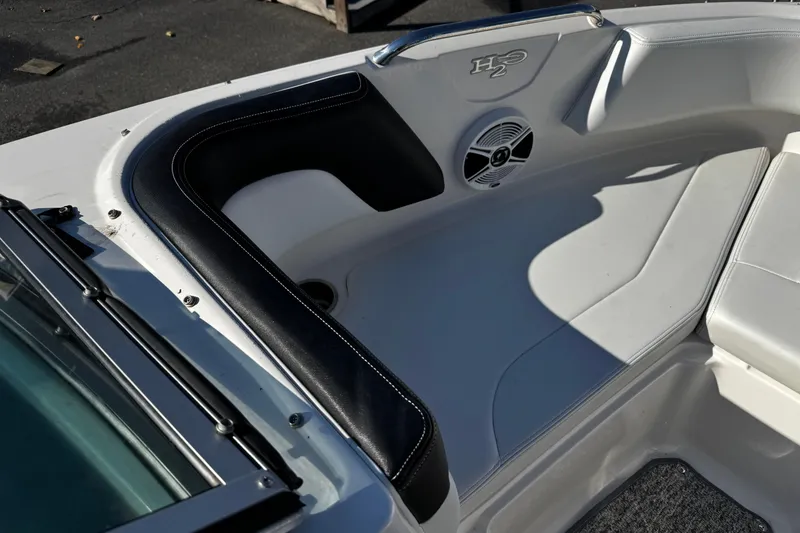 Slide: The Image of Interior of 2016 Chaparral 21 H2O Sport boat with seating and speaker. - 13