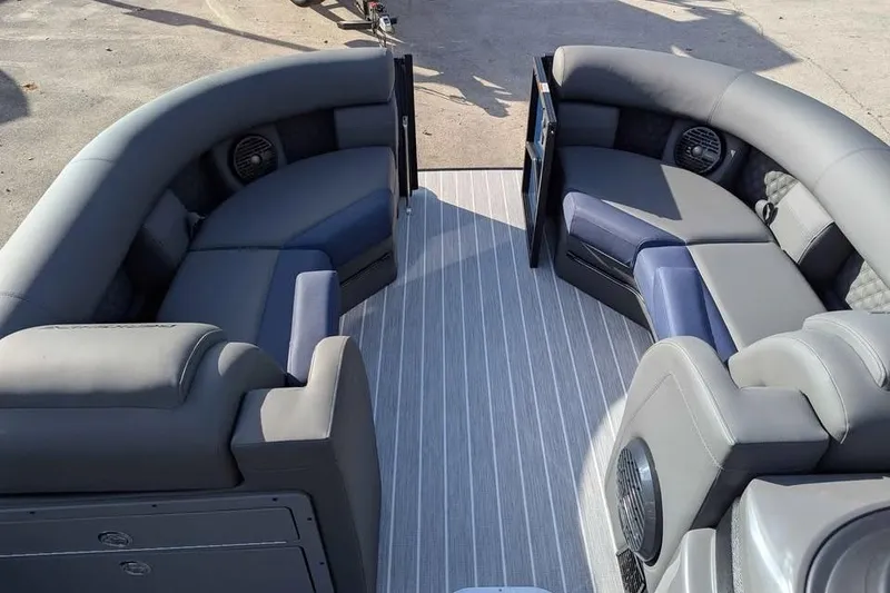 Slide: The Image of 2026 Berkshire 23RFX STS pontoon boat interior with luxurious seating and modern design. - 11