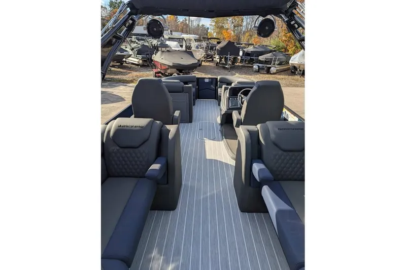 Slide: The Image of 2026 Berkshire 23RFX STS boat interior with luxurious seating and modern design. - 9