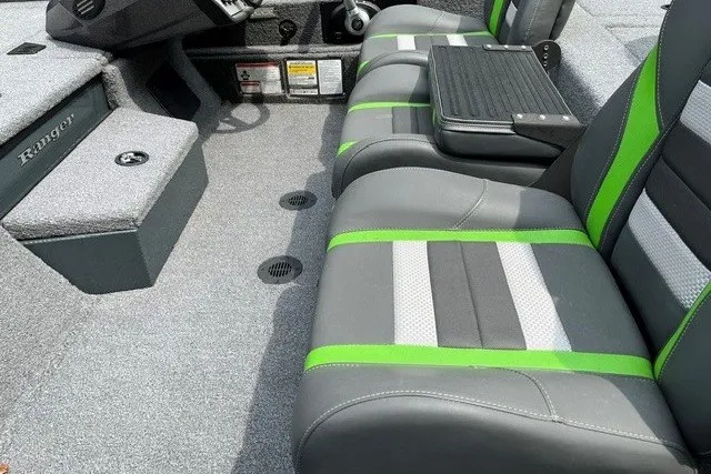 Slide: The Image of 2026 Ranger RT198P boat interior with gray and green seating, modern design. - 100