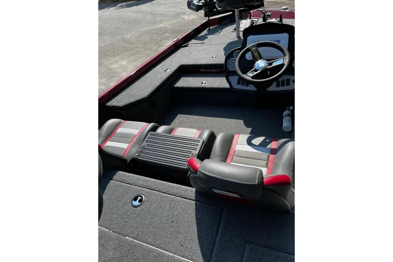 Slide: The Image of 2026 Ranger RT178 boat interior with steering wheel and seating. - 7