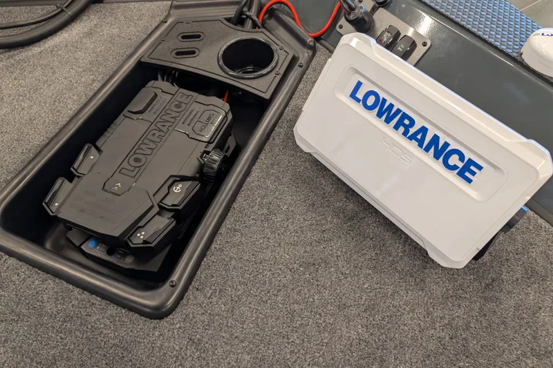 Slide: The Image of Ranger RT188 2026 boat with Lowrance electronics and storage compartment. - 12