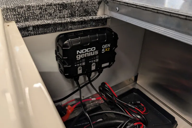 Slide: The Image of NOCO Genius GEN5X2 charger installed in 2026 Ranger RT188 boat compartment. - 9