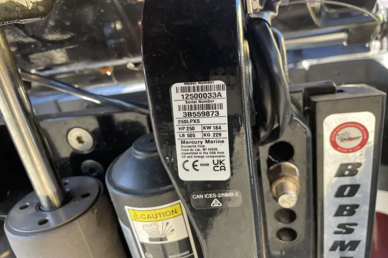 Slide: The Image of Label on a 2026 Nitro Z20 XL boat engine, showing specifications and caution details. - 101