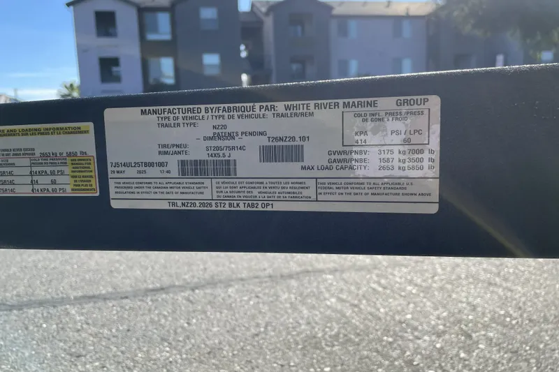 Slide: The Image of Label on a 2026 Nitro Z20 XL trailer, detailing specifications and manufacturing information. - 103