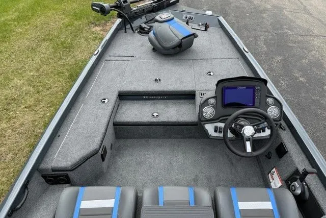 Slide: The Image of 2026 Ranger RT178 boat interior with steering console and seating, featuring modern design and controls. - 91