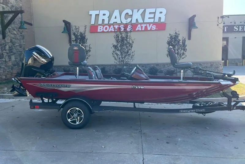 The Image of 2026 Ranger RT178 boat on trailer outside Tracker Boats store. - 0