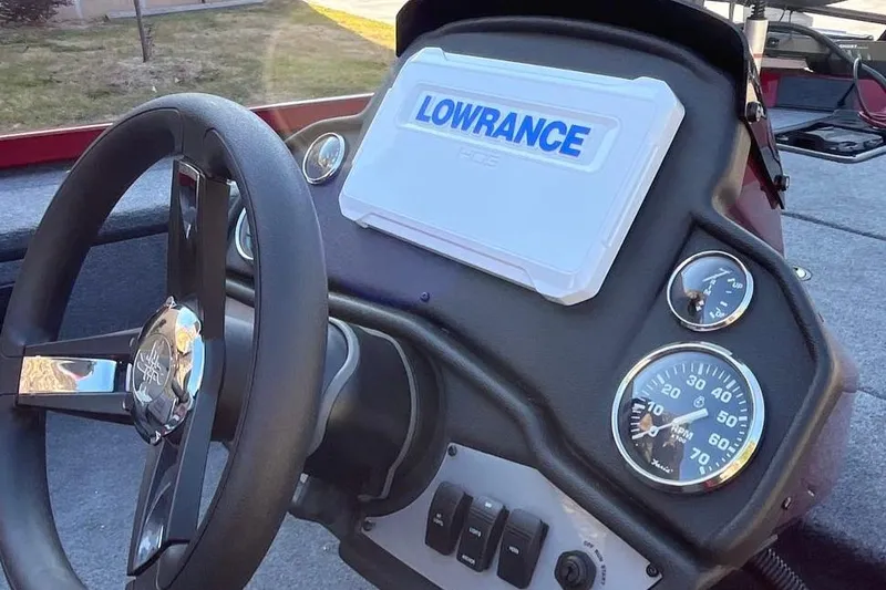 Slide: The Image of 2026 Ranger RT178 dashboard with Lowrance display and gauges. - 5