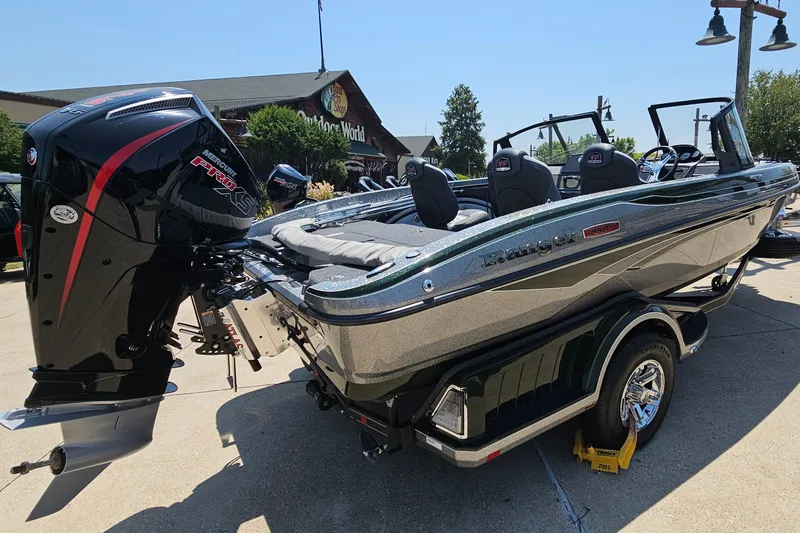 Slide: The Image of 2026 Ranger 1850MS boat with Mercury Pro XS engine, parked outdoors on a sunny day. - 5