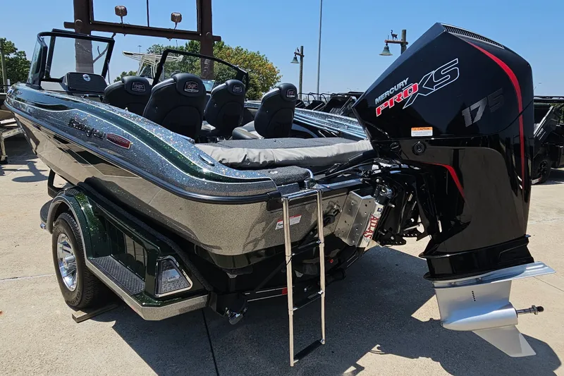 Slide: The Image of 2026 Ranger 1850MS boat with Mercury Pro XS 175 engine, parked outdoors. - 7