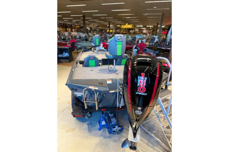 Slide: The Image of 2026 Ranger RT198P boat with Mercury 150 Pro XS engine in showroom. - 4