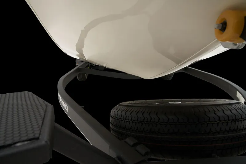 Slide: The Image of 2026 Ranger RT198P boat with Minn Kota Maxxum trolling motor in a parking lot. - 6