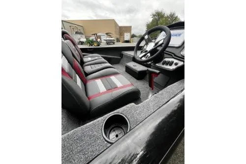 Slide: The Image of 2026 Ranger RT188P boat interior with steering wheel and seating. - 7