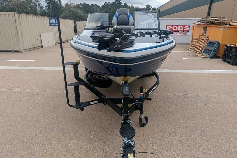 Slide: The Image of 2026 Nitro ZV19 Sport Pro boat on trailer in parking lot. - 4