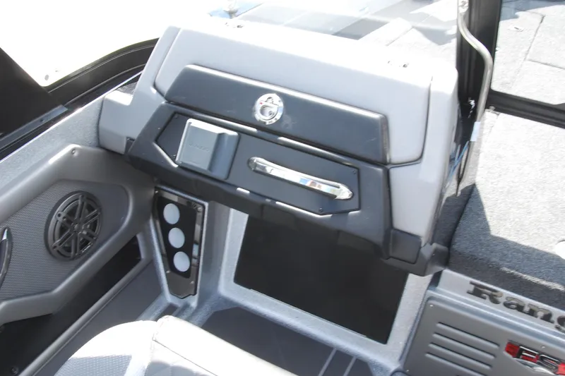 Slide: The Image of 2026 Ranger 621FS Cup Equipped boat dashboard with speaker and storage compartments. - 11