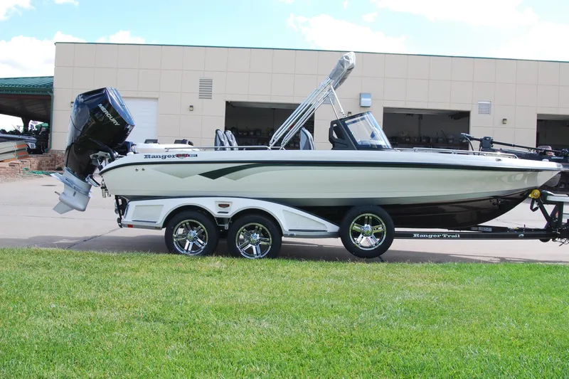 Slide: The Image of 2026 Ranger 621FS Cup Equipped boat on trailer, parked outdoors. - 4