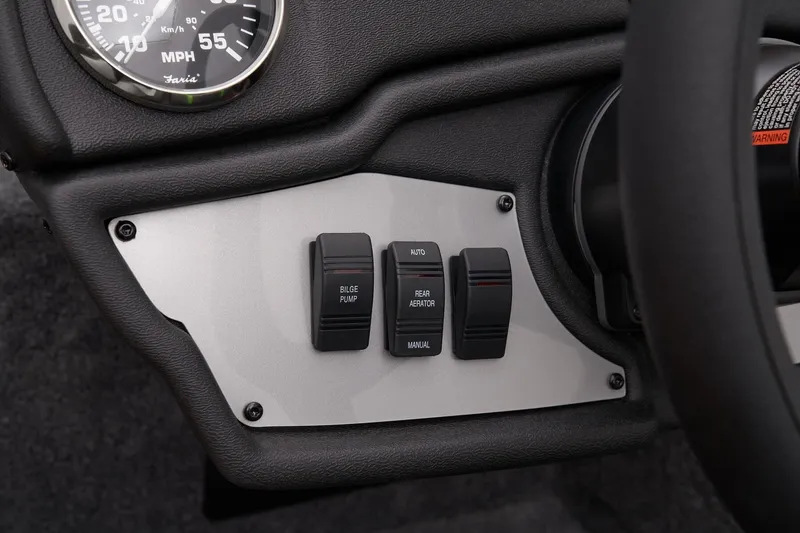 Slide: The Image of 2026 Ranger RT178 dashboard controls with bilge pump and rear aerator switches. - 19