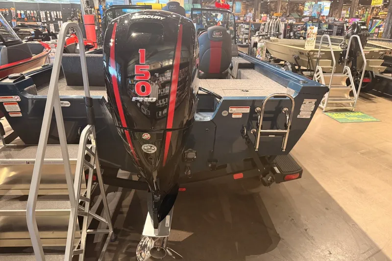 Slide: The Image of 2026 Ranger RT178 boat with Mercury 150 Pro engine displayed in showroom. - 5