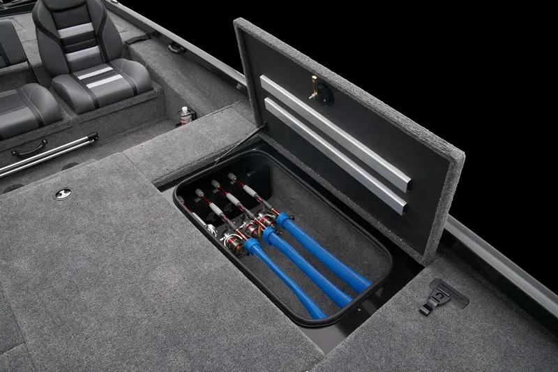 Slide: The Image of Storage compartment in 2026 Ranger RT188P boat, featuring carpeted interior and secure latch. - 17