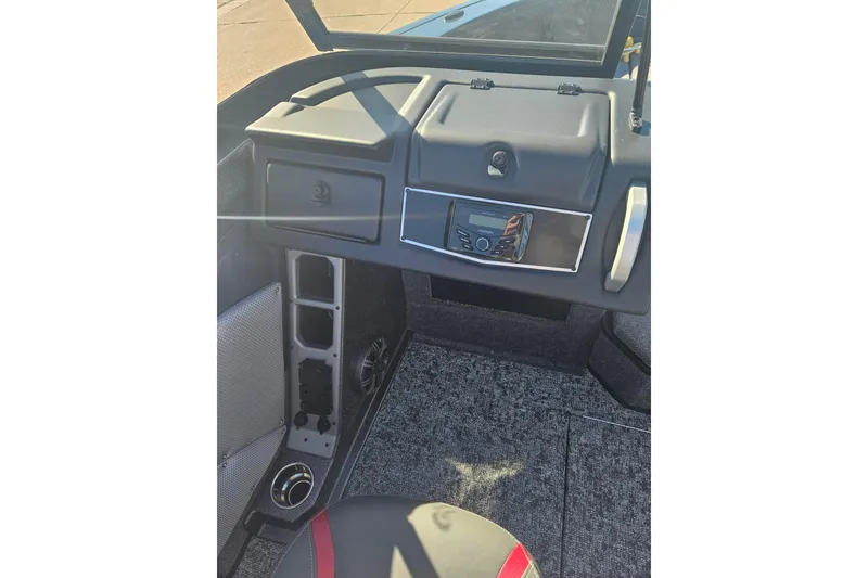 Slide: The Image of 2026 Ranger VX1788 WT boat interior dashboard with modern controls and seating. - 10