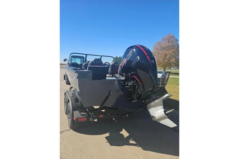 Slide: The Image of 2026 Ranger VX1788 WT boat with powerful outboard motor on a trailer. - 2