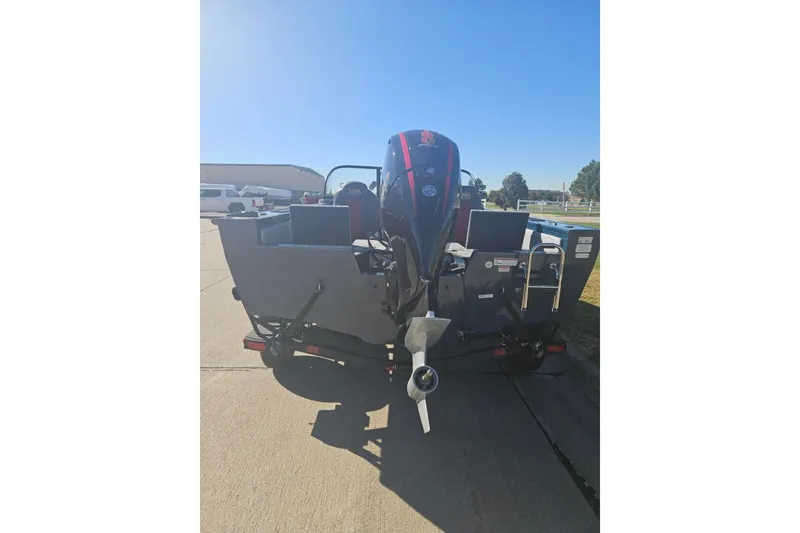 Slide: The Image of 2026 Ranger VX1788 WT boat with powerful outboard motor on a sunny day. - 3